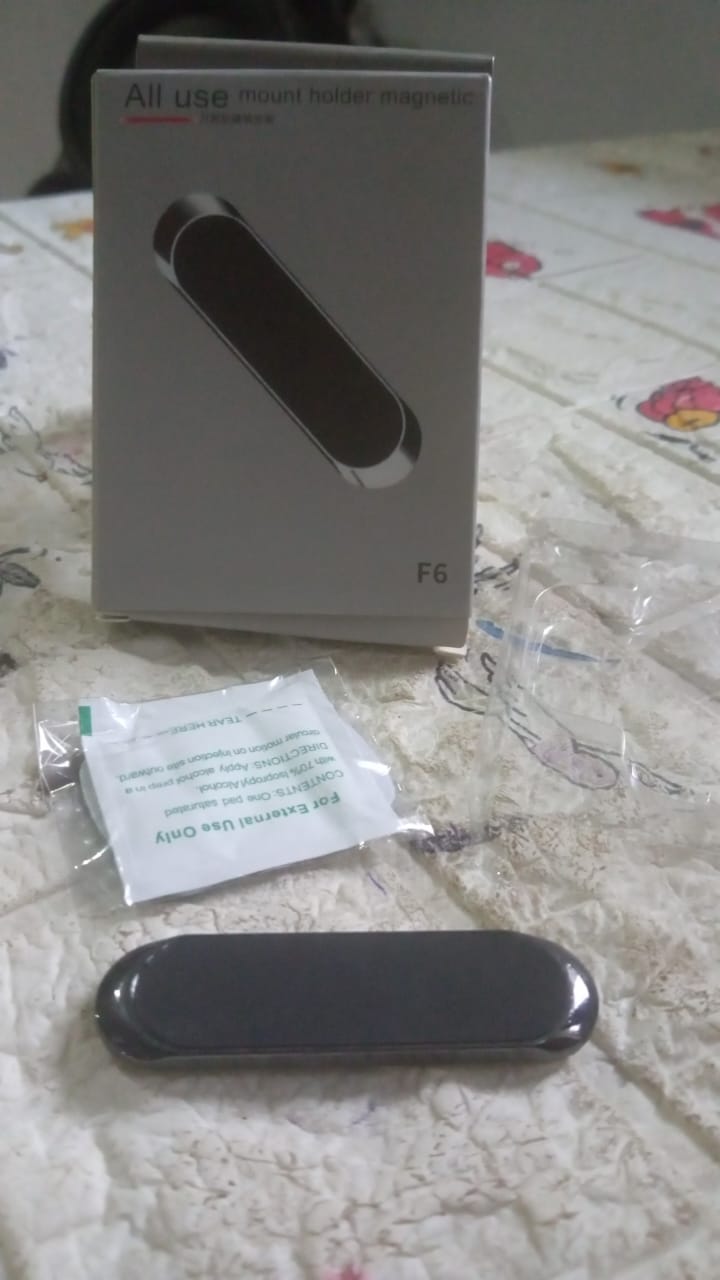 Strong magnet phone holder for multiple uses. Strong magnet phone holder for multiple uses.